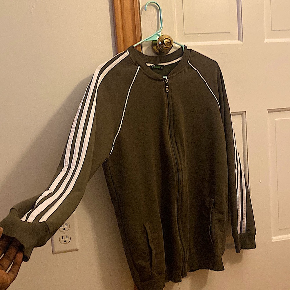 Dark green Adidas jacket form Dubai